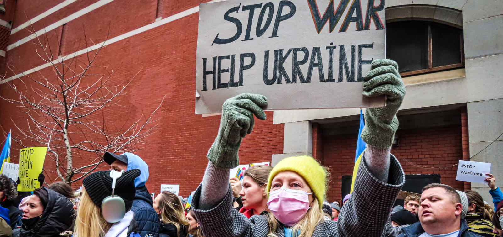 Civilians demonstrate to against the war in Ukraine. Photo by Katie Godowski